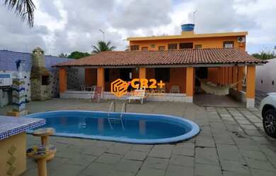 Imagem: A casa possui 5 Dormitórios, 2 Banheiros, 5 Vagas na garagem