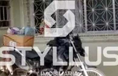 Imagem: A casa possui 3 Dormitórios, 5 Banheiros, 4 Vagas na garagem