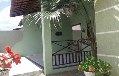 Imagem: A casa possui 3 Dormitórios, 3 Banheiros, 3 Vagas na garagem