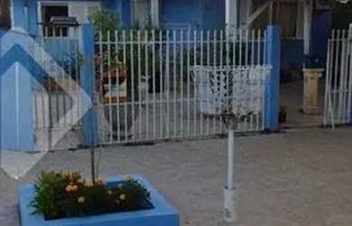 Imagem: A casa possui 4 Dormitórios, 2 Banheiros, 2 Vagas na garagem