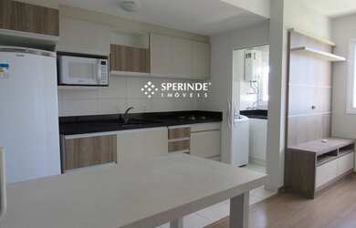 Imagem: O apartamento possui 1 Dormitório, 1 Banheiro, 1 Vaga na garagem