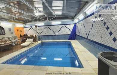 Imagem: A casa em condomínio possui 3 Dormitórios, 4 Banheiros, 4