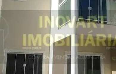 Imagem: A casa possui 3 Dormitórios, 2 Banheiros, 2 Vagas na garagem