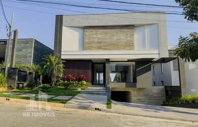 Imagem: A casa em condomínio possui 4 Dormitórios, 5 Banheiros, 5