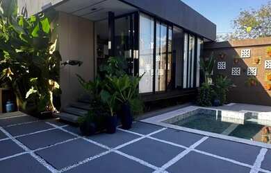 Imagem: A casa possui 4 Dormitórios, 4 Banheiros, 3 Vagas na garagem