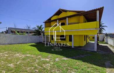 Imagem: A casa possui 5 Dormitórios, 4 Banheiros, 5 Vagas na garagem