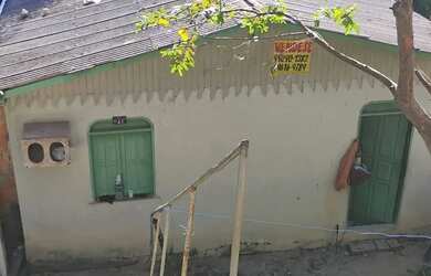 Imagem: A casa possui 3 Dormitórios, 2 Banheiros, 140m² de Área e