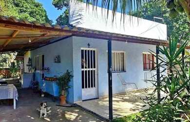 Imagem: A casa possui 2 Dormitórios, 1 Banheiro, 1 Vaga na garagem