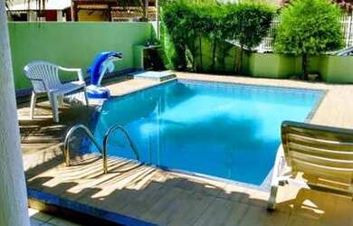 Imagem: A casa possui 4 Dormitórios, 1 Vaga na garagem e está localizado