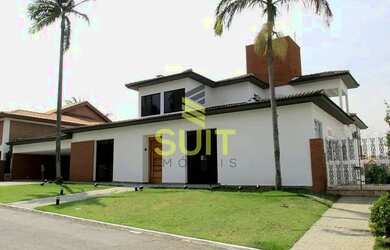 Imagem: A casa possui 4 Dormitórios, 5 Banheiros, 5 Vagas na garagem