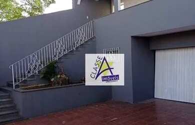 Imagem: A casa possui 4 Dormitórios, 3 Banheiros, 5 Vagas na garagem