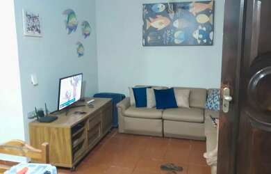 Imagem: A casa possui 2 Dormitórios, Acomodam 10 pessoas, 4 Vagas na