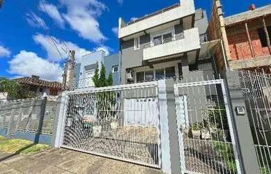 Imagem 2: Casa em Porto Alegre, no bairro Hípica, com 3 dormitório s , e 3 banheiros,...