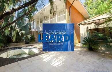 Imagem: A casa possui 4 Dormitórios, 5 Banheiros, 5 Vagas na garagem