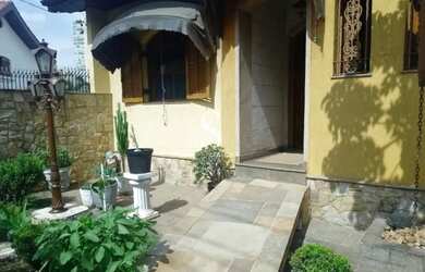 Imagem: A casa possui 5 Dormitórios, 5 Banheiros, 5 Vagas na garagem