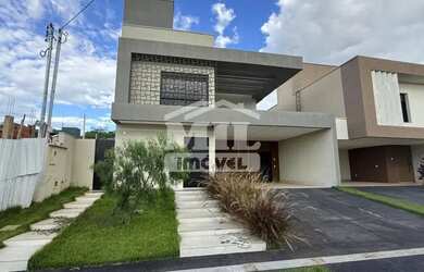 Imagem: A casa possui 4 Dormitórios, 5 Banheiros, 4 Vagas na garagem