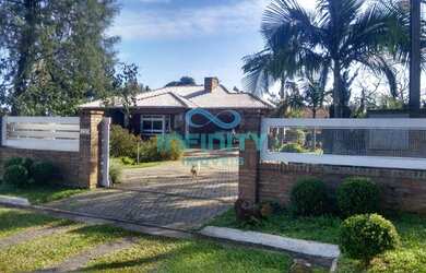 Imagem: A casa em condomínio possui 2 Dormitórios, 2 Banheiros, 4