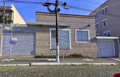 Imagem: A casa possui 3 Dormitórios, 4 Banheiros, 3 Vagas na garagem