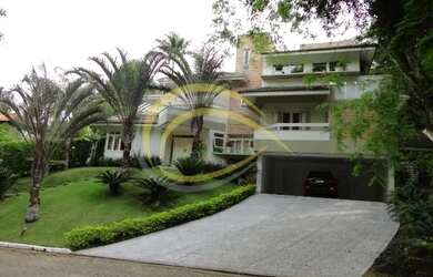 Imagem: A casa em condomínio possui 4 Dormitórios, 5 Banheiros, 5