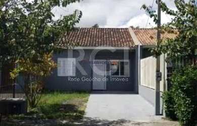 Imagem: A casa possui 2 Dormitórios, 1 Banheiro, 2 Vagas na garagem