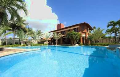 Imagem: A casa possui 5 Dormitórios, 5 Banheiros, 5 Vagas na garagem