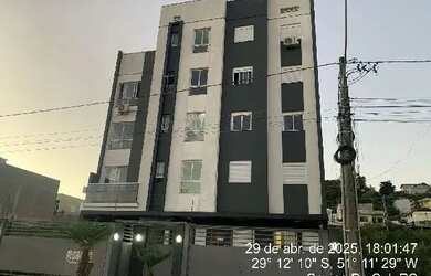 Imagem: O apartamento possui 2 Dormitórios, 1 Banheiro, 1 Vaga na garagem