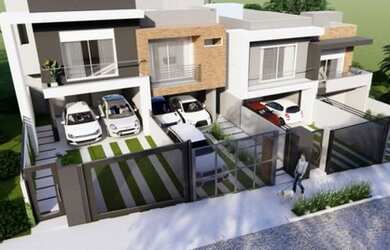 Imagem: A casa possui 3 Dormitórios, 2 Banheiros, 2 Vagas na garagem