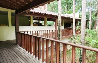 Imagem: A casa possui 4 Dormitórios, 5 Banheiros, 5 Vagas na garagem