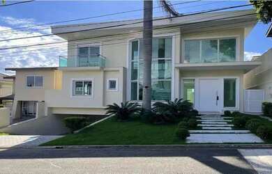 Imagem: A casa em condomínio possui 4 Dormitórios, 5 Banheiros, 4