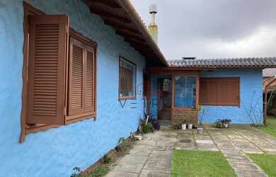 Imagem: A casa possui 4 Dormitórios, 2 Banheiros e 148m² de Área