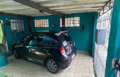 Imagem: A casa possui 2 Dormitórios, 1 Banheiro, 1 Vaga na garagem