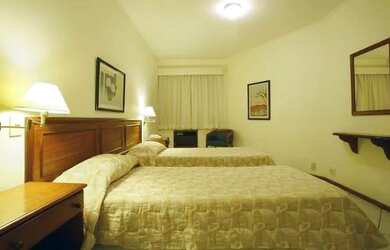 Imagem: O apartamento possui 1 Dormitório, 1 Banheiro, 1 Vaga na garagem