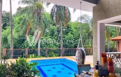 Imagem: A casa em condomínio possui 4 Dormitórios, 4 Banheiros, 3