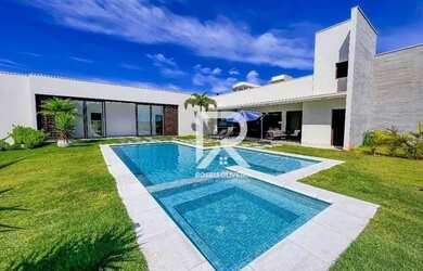 Imagem: A casa em condomínio possui 5 Dormitórios, 5 Banheiros, 4