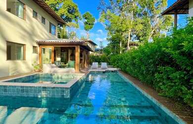 Imagem: A casa em condomínio possui 5 Dormitórios, 5 Banheiros, 3