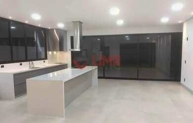 Imagem: A casa possui 3 Dormitórios, 5 Banheiros, 5 Vagas na garagem