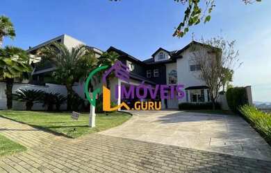 Imagem: A casa em condomínio à venda possui 5 Dormitórios, 5 Banheiros