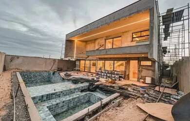 Imagem: A casa em condomínio possui 4 Dormitórios, 5 Banheiros, 5