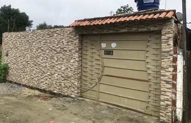 Imagem: A casa à venda possui 3 Dormitórios, 2 Banheiros e 2 Vagas