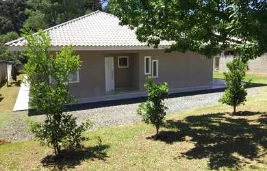 Imagem: A casa possui 3 Dormitórios, 3 Banheiros, 3 Vagas na garagem