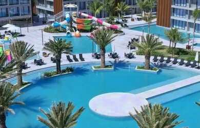 Imagem 2: COTA PORTO 2 LIFE. Piscina, Churrasqueira, Imóvel mobiliadoeAr-condicionado