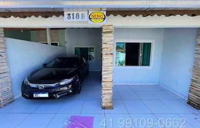 Imagem: A casa possui 3 Dormitórios, Acomodam 10 pessoas, 3 Vagas na