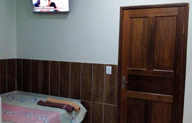 Imagem: O quarto possui Guarda roupa e está localizado em Cinturão