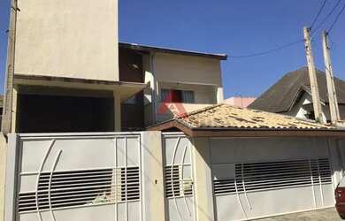 Imagem: A casa possui 3 Dormitórios, 3 Banheiros, 3 Vagas na garagem