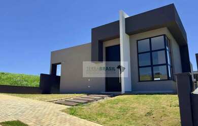 Imagem: A casa possui 3 Dormitórios, 2 Banheiros, 2 Vagas na garagem