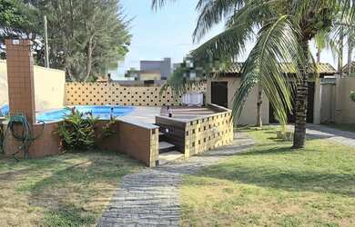 Imagem: A casa possui 3 Dormitórios, 3 Banheiros, 3 Vagas na garagem