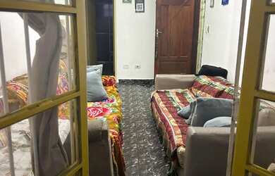 Imagem: A casa possui 2 Dormitórios, Acomodam 10 pessoas, 2 Vagas na