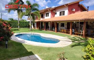 Imagem: A casa em condomínio à venda possui 4 Dormitórios, 5 Banheiros