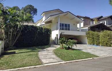 Imagem: A casa possui 4 Dormitórios, 4 Banheiros, 3 Vagas na garagem