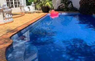 Imagem: A casa em condomínio possui 5 Dormitórios, 5 Banheiros, 2